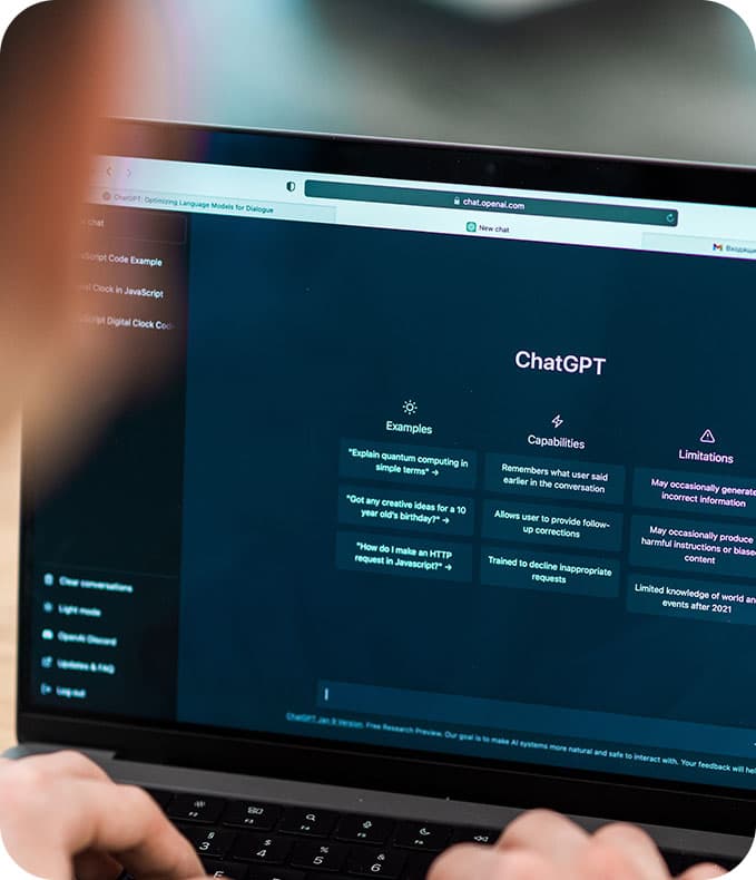 Laptop screen showing ChatGPT and other AI tools on a desktop